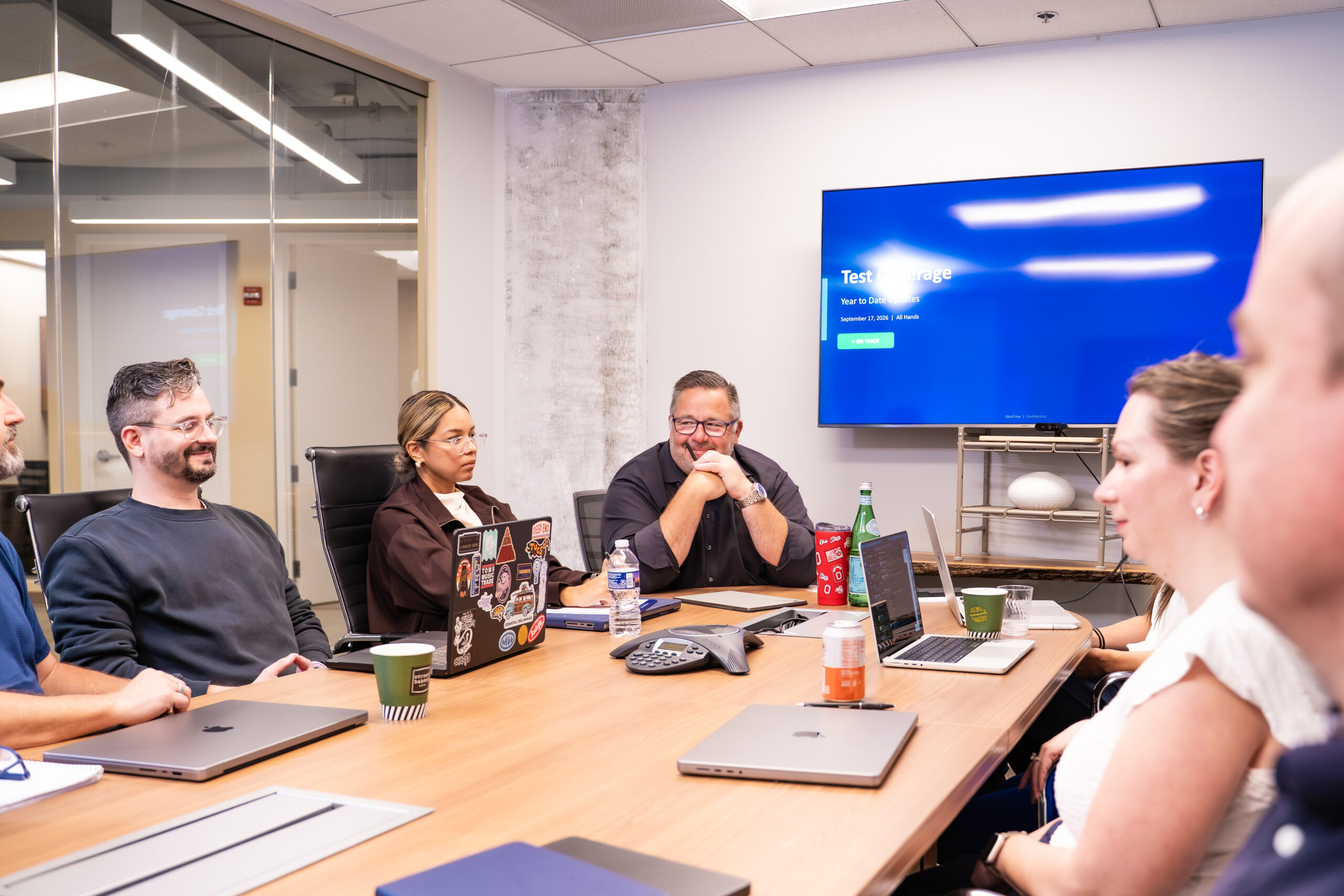 IdeaCrew employees having a meeting